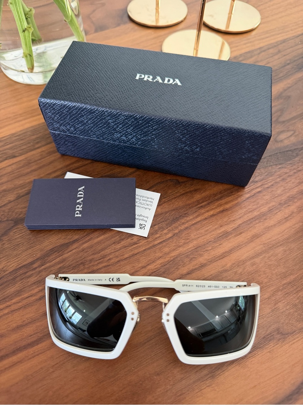 Prada White Frame Sunglasses with Black Lenses